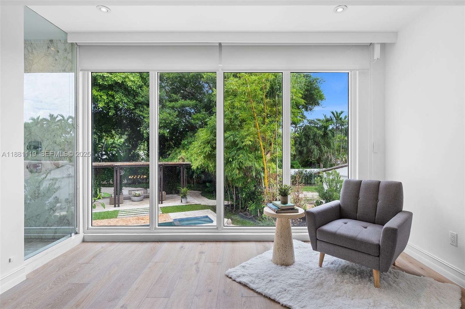 575 Bay Point Road Miami, FL 33137 - Photo 52 of 87 a living room with furniture and a potted plant
