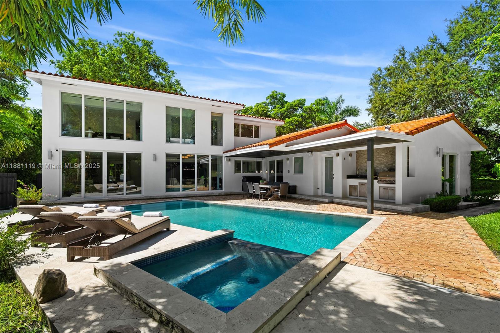 575 Bay Point Road Miami, FL 33137 - Photo 65 of 87 a view of a house with swimming pool and sitting area
