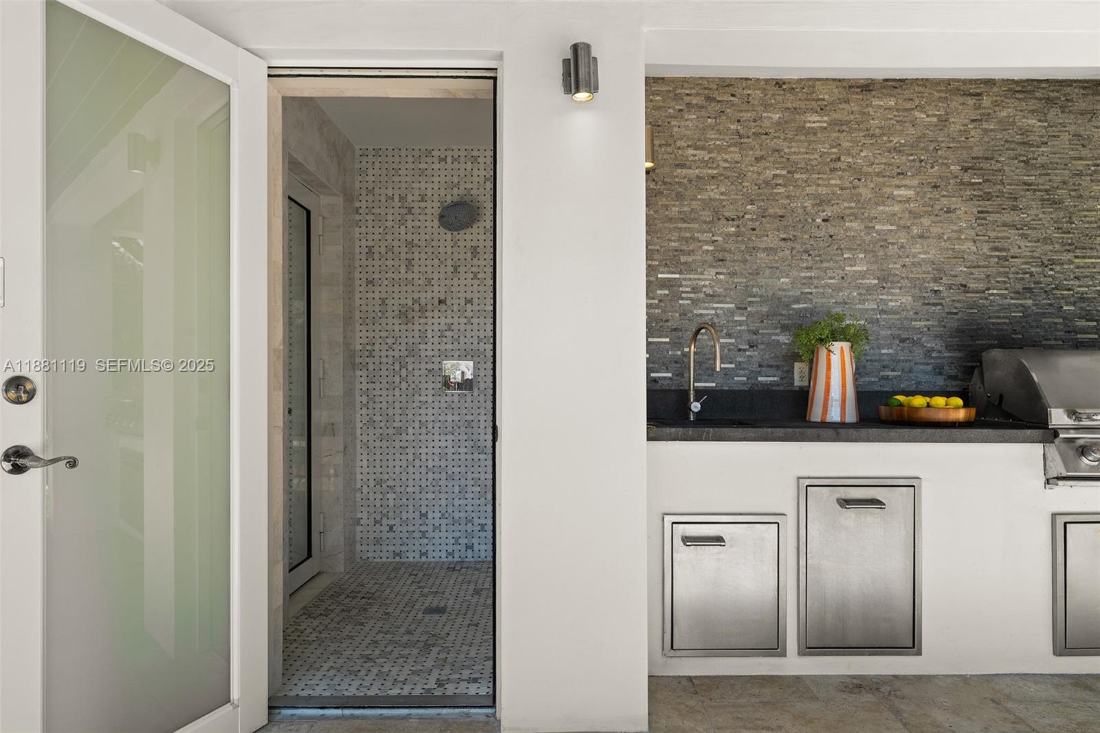 575 Bay Point Road Miami, FL 33137 - Photo 70 of 87 a bathroom with a shower