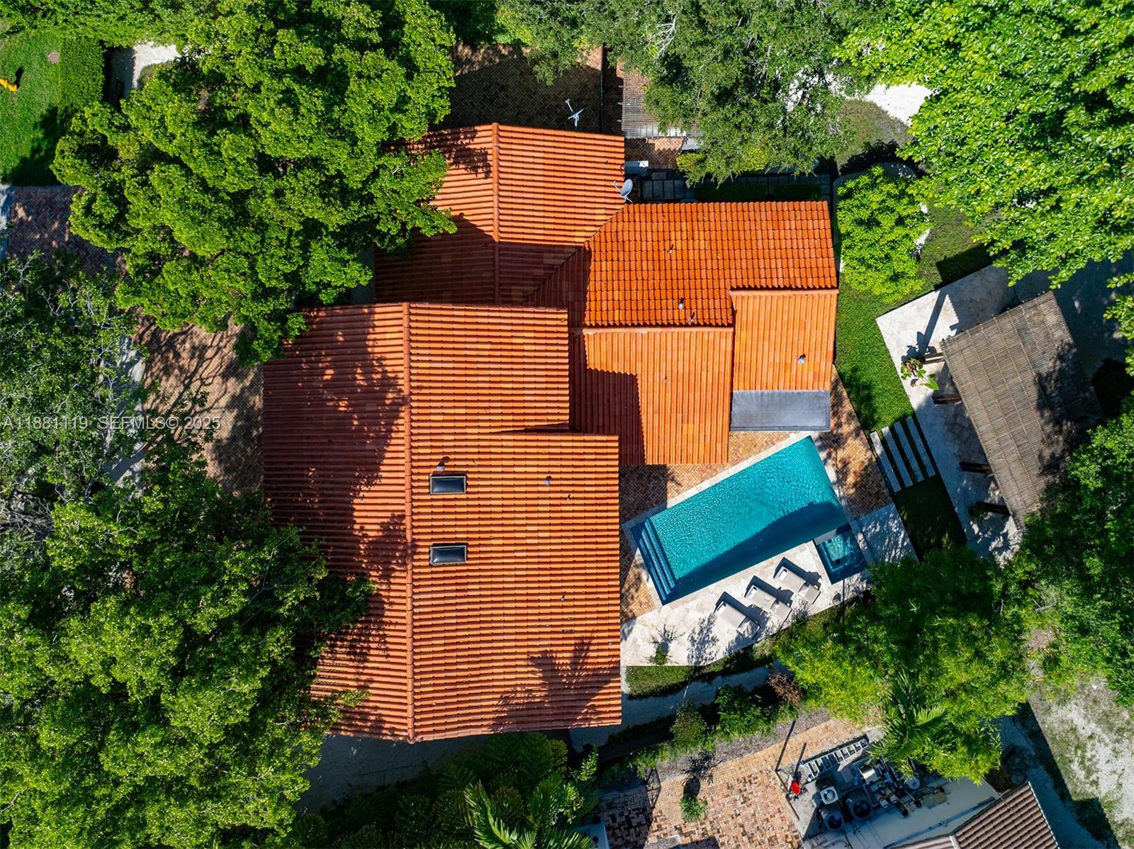 575 Bay Point Road Miami, FL 33137 - Photo 79 of 87 an aerial view of a house with a yard