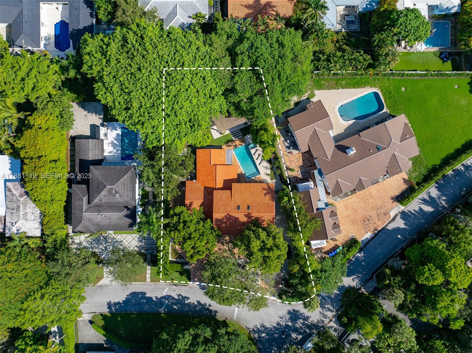 575 Bay Point Road Miami, FL 33137 - Photo 81 of 87 an aerial view of a house with a garden