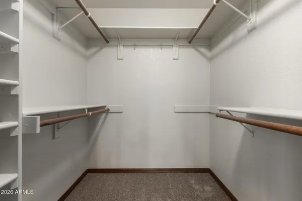 a view of a room with racks on the wall