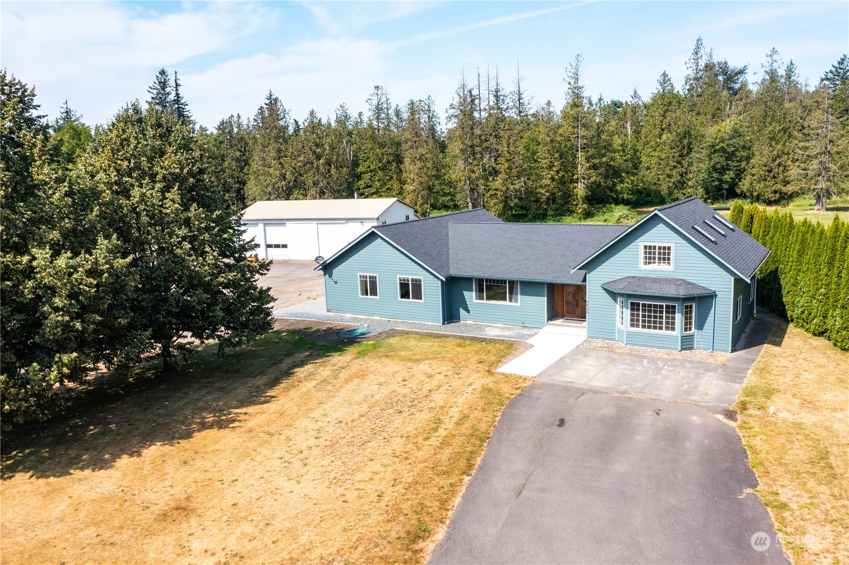 7730 Goodwin Road Everson, WA 98247 - Photo 1 of 39 a front view of a house with a yard