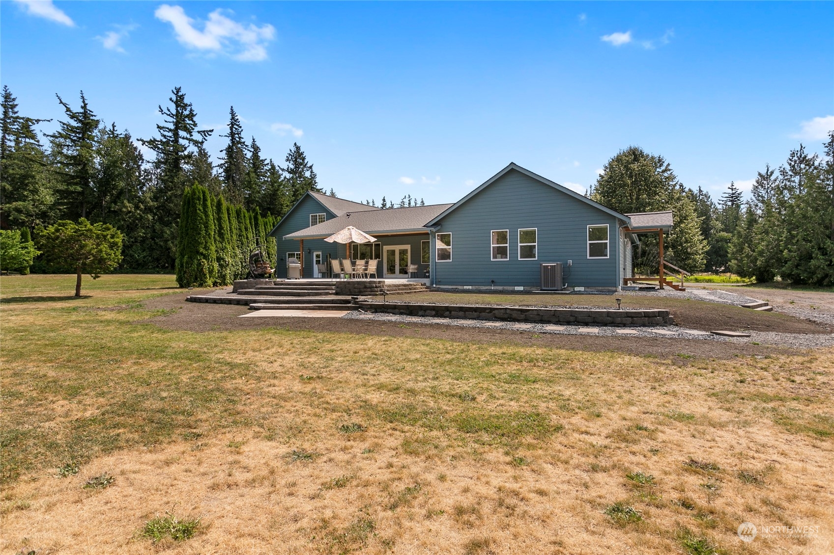 7730 Goodwin Road Everson, WA 98247 - Photo 38 of 39 a front view of a house with a yard