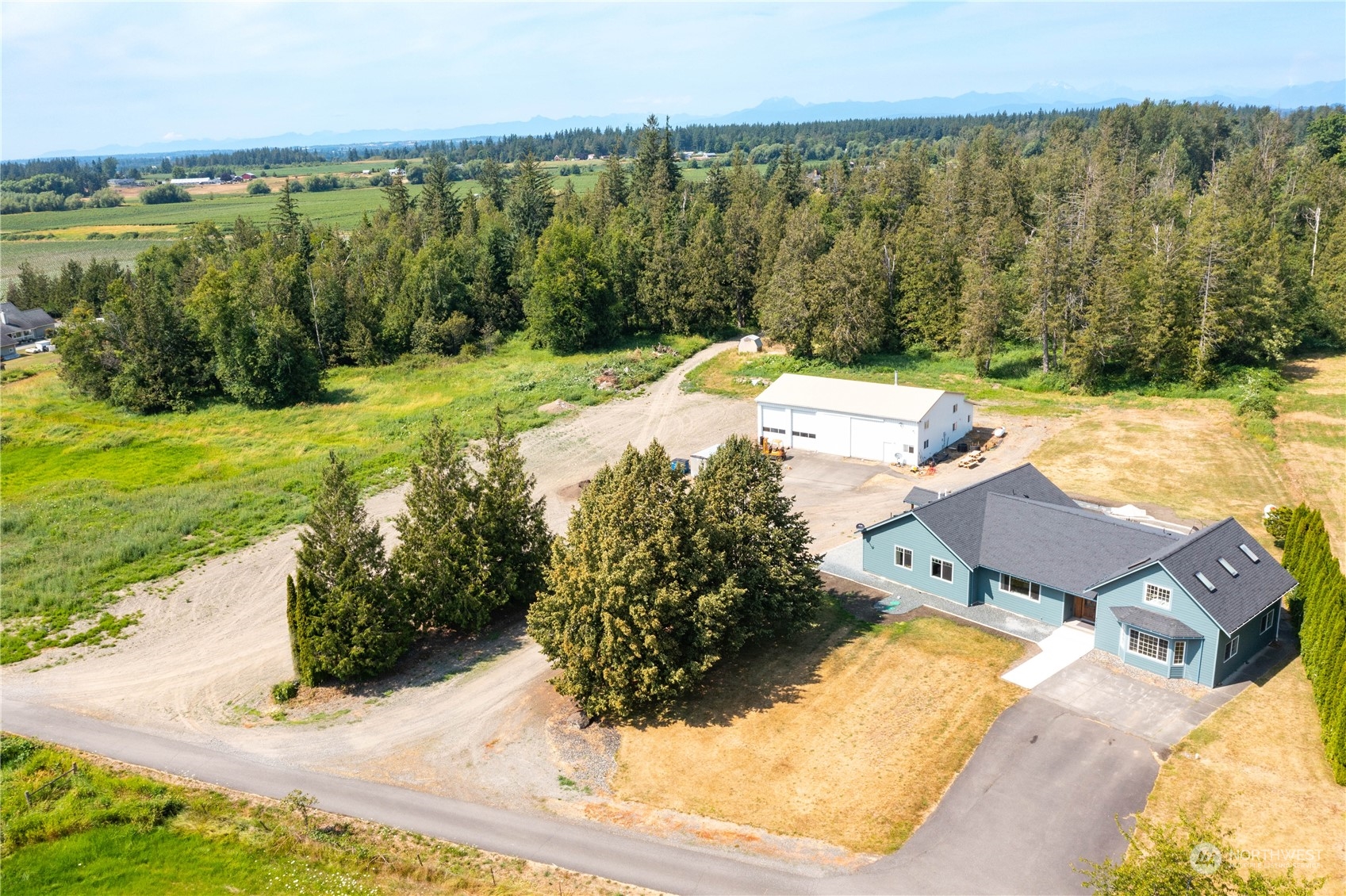 7730 Goodwin Road Everson, WA 98247 - Photo 39 of 39 a view of a swimming pool with a patio