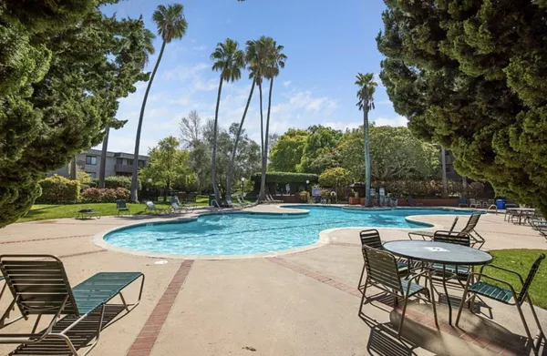 a view of a backyard with a patio