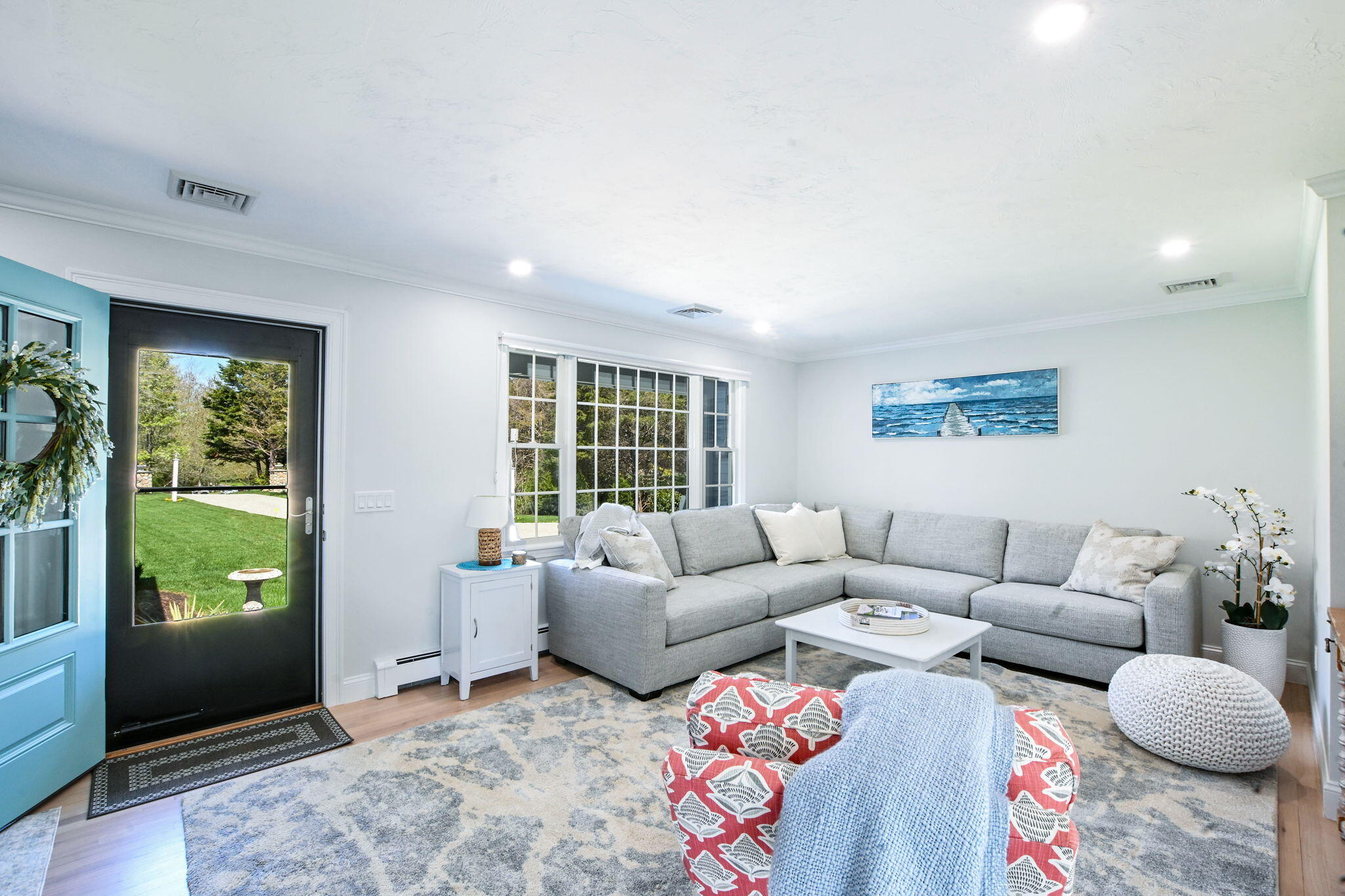 9 Coach Lane Sandwich, MA 02563 - Photo 13 of 38 a living room with furniture and a large window