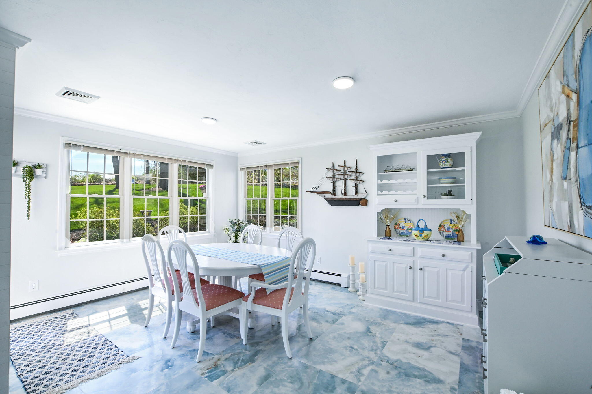 9 Coach Lane Sandwich, MA 02563 - Photo 17 of 38 a view of a dining room with furniture and a window