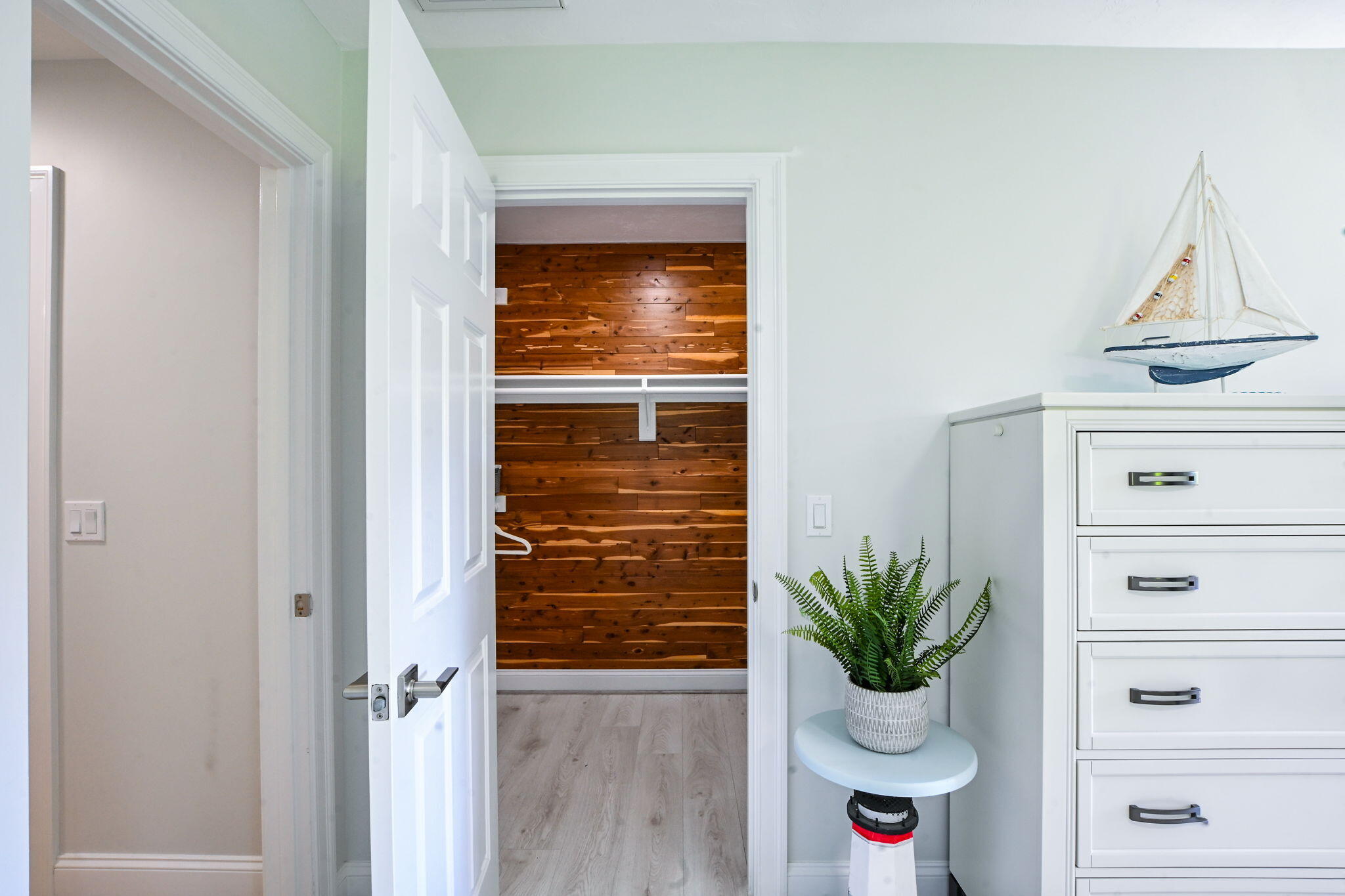 9 Coach Lane Sandwich, MA 02563 - Photo 26 of 38 a bathroom with a potted plant on the wall and a shower