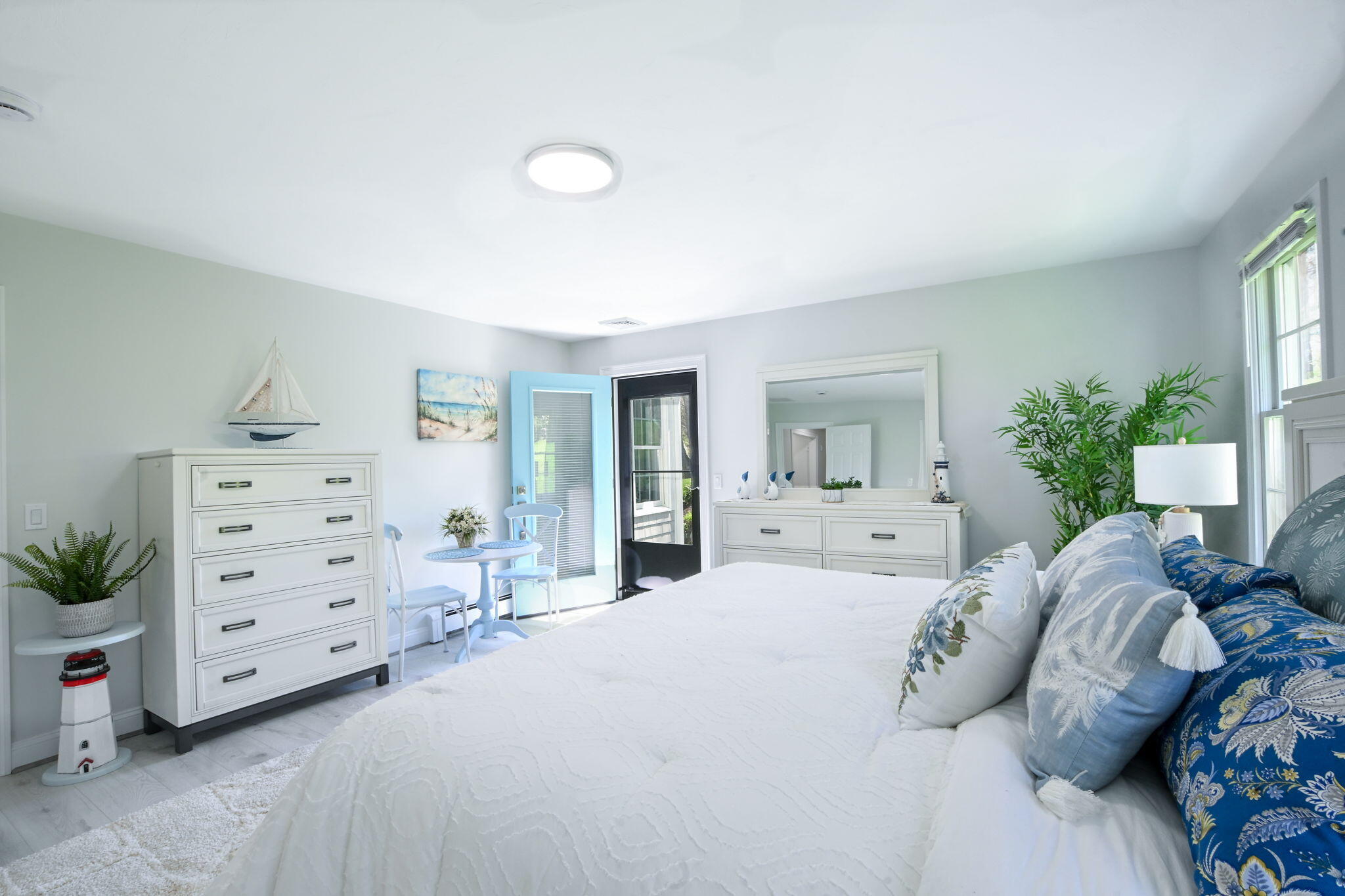 9 Coach Lane Sandwich, MA 02563 - Photo 29 of 38 a bedroom with a bed and a couch