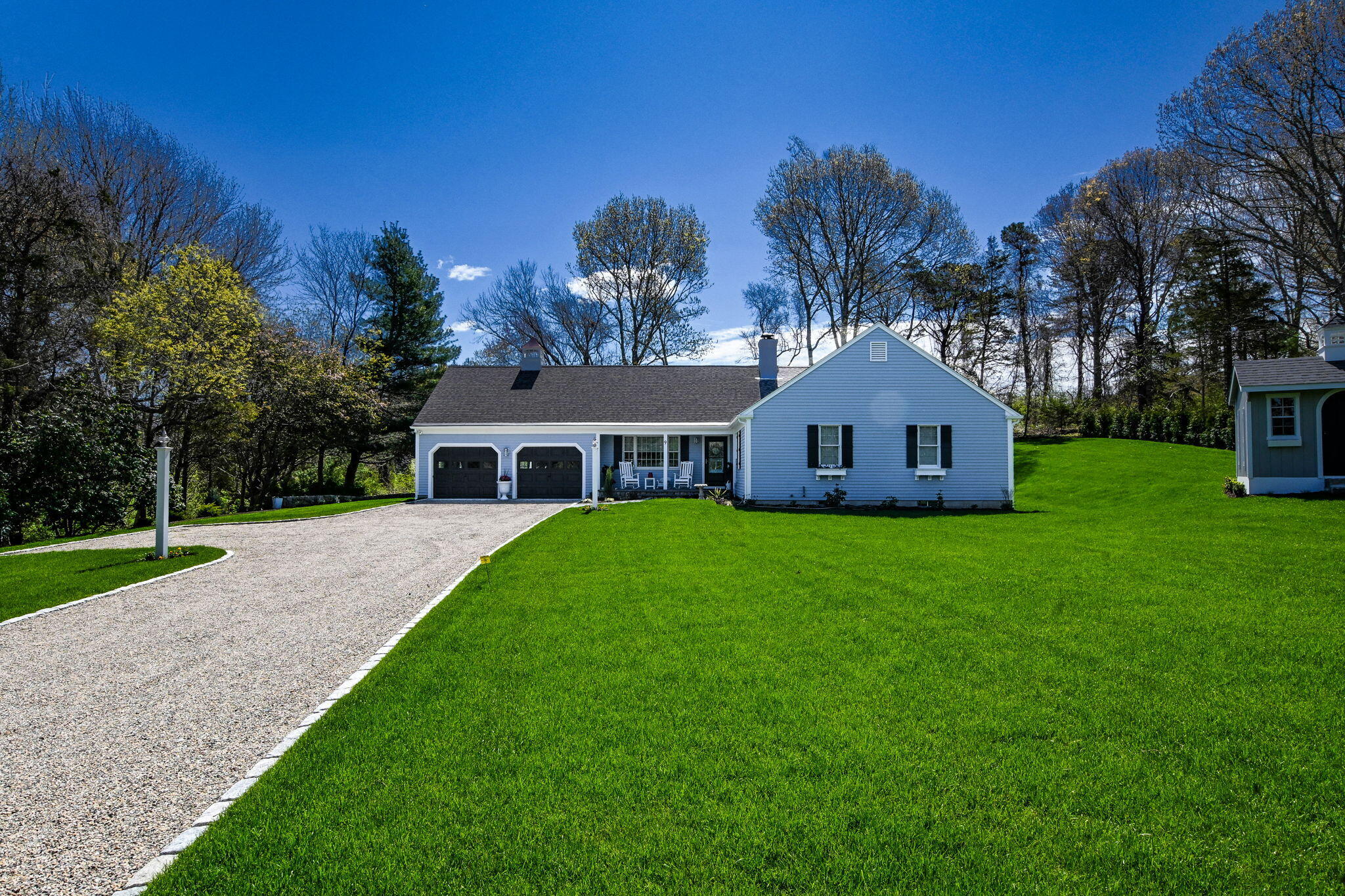 9 Coach Lane Sandwich, MA 02563 - Photo 3 of 38 a front view of a house with garden