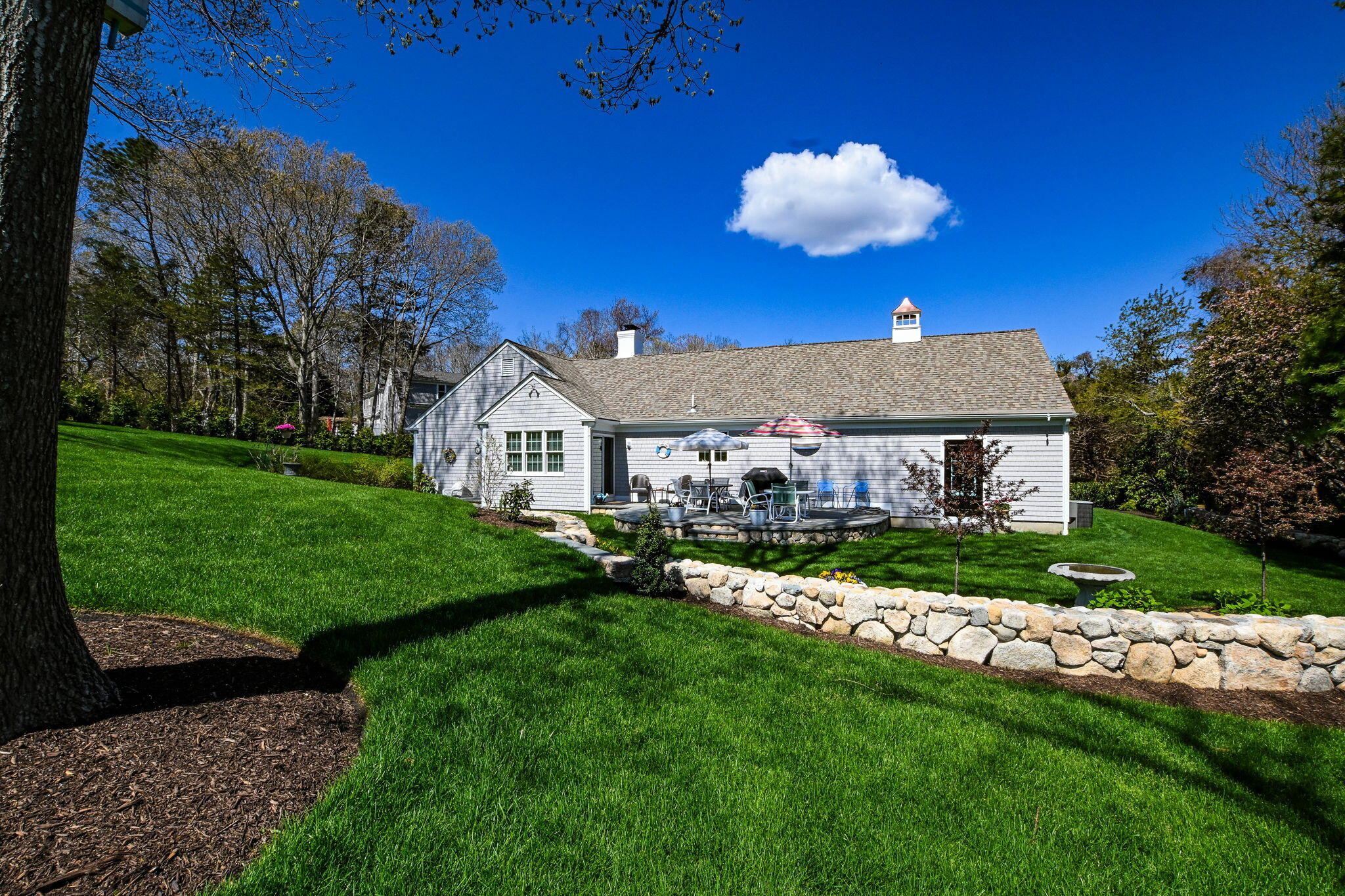 9 Coach Lane Sandwich, MA 02563 - Photo 9 of 38 a front view of a house with garden