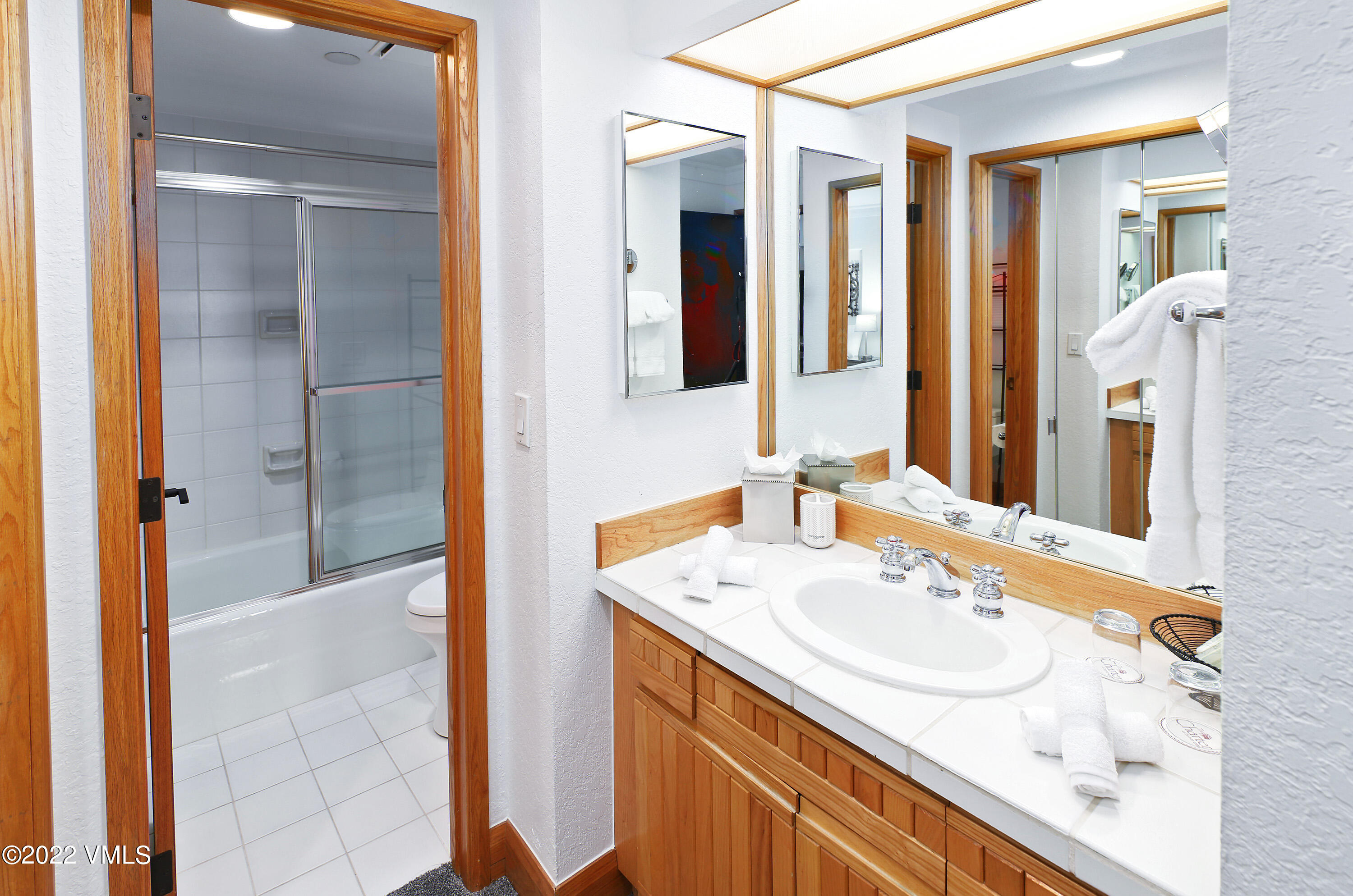 120 Offerson Road, Unit E440 Beaver Creek, CO 81620 - Photo 13 of 22 a bathroom with a sink and a mirror