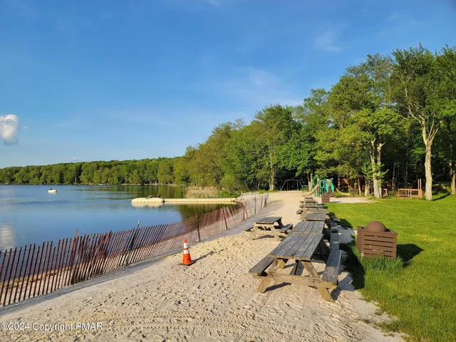 a view of a lake with a patio