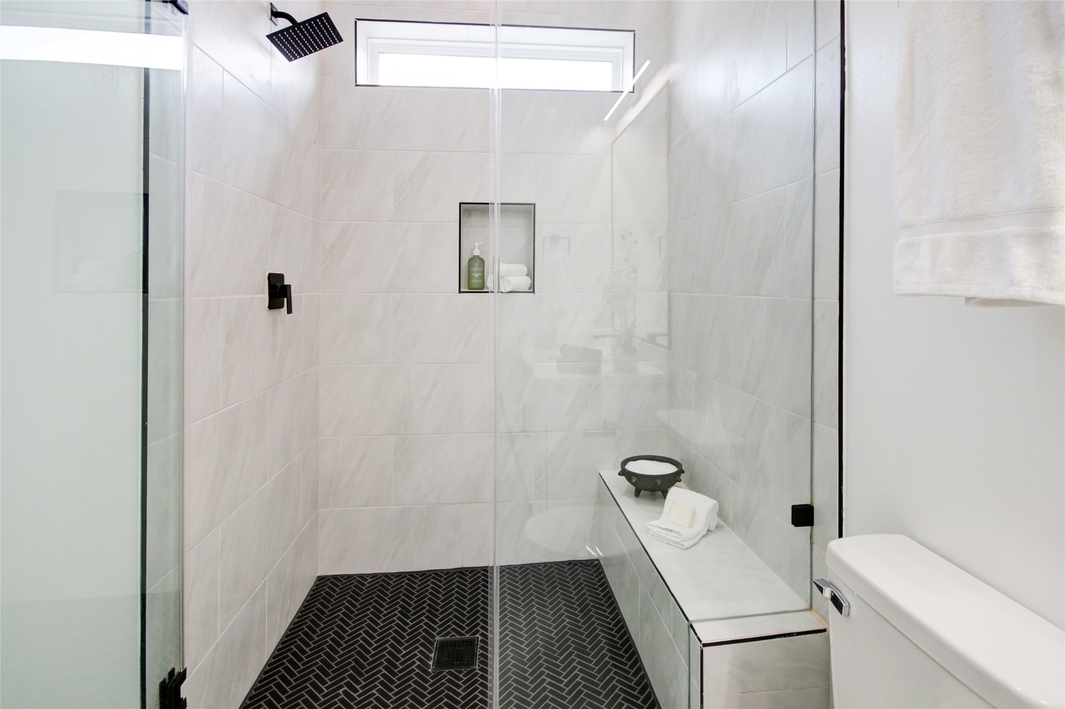 1214 West 24th Street, Unit D Houston, TX 77008 - Photo 33 of 45 a bathroom with a granite countertop shower