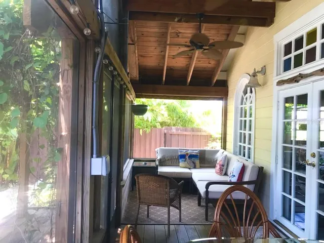 a view of a patio filled with furniture