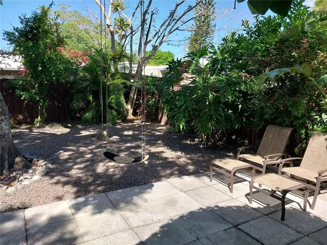 a view of backyard with trees