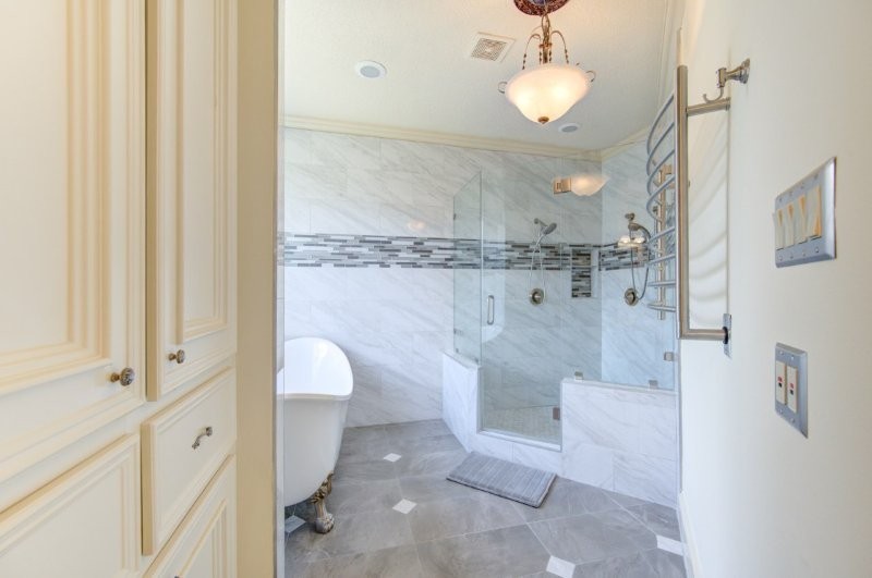 122 Vieux Carre Drive Houston, TX 77009 - Photo 30 of 47 a bathroom with a granite countertop sink a toilet and shower