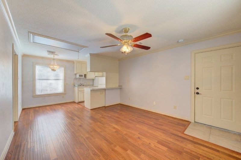 122 Vieux Carre Drive Houston, TX 77009 - Photo 45 of 47 wooden floor in an empty room with a window