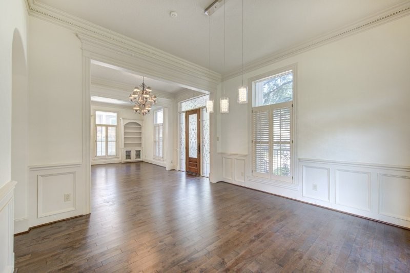 122 Vieux Carre Drive Houston, TX 77009 - Photo 6 of 47 a view of an empty room with wooden floor and a window