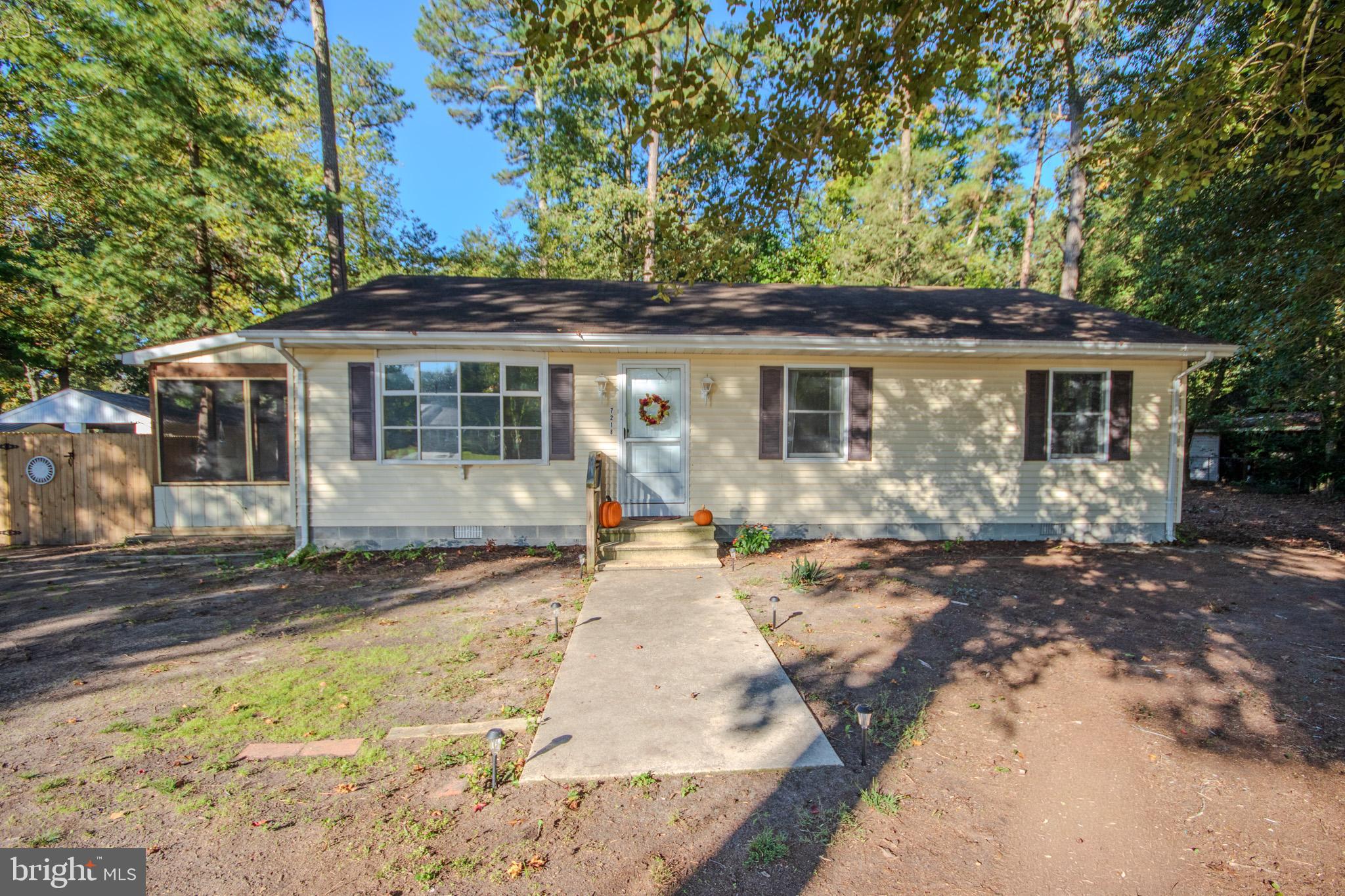 front view of a house with a chairs