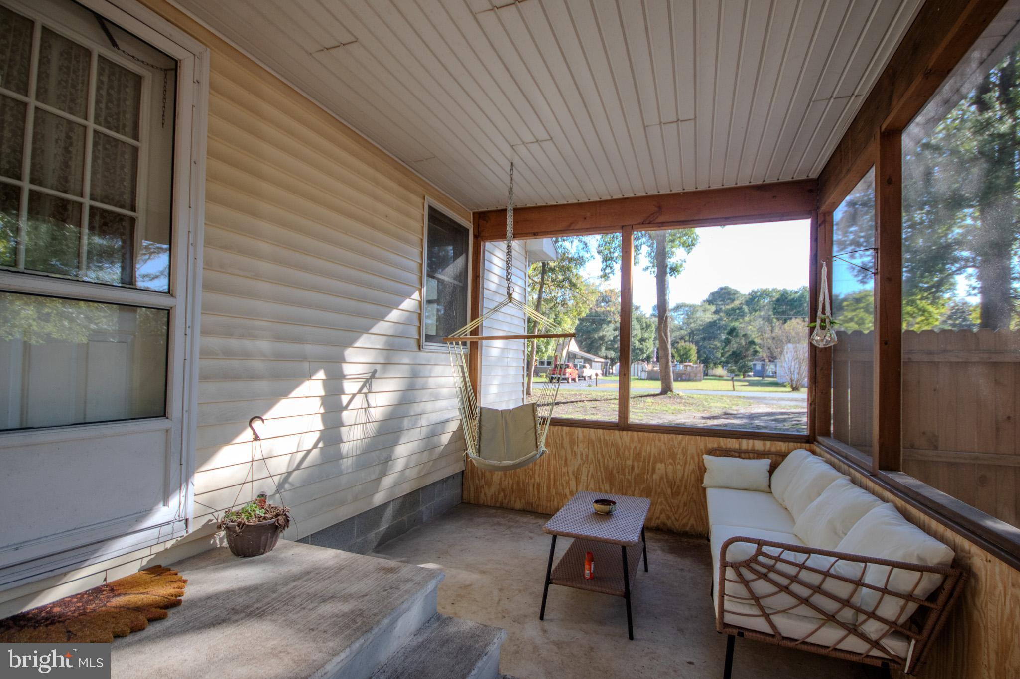 7218 Walston Switch Road Parsonsburg, MD 21849 - Photo 21 of 28 a backyard of a house with outdoor seating