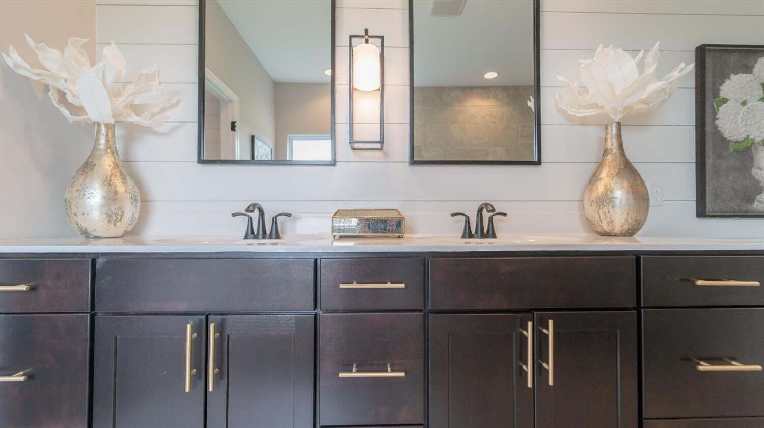 3098 Fawn Lane Portage, IN 46368 - Photo 19 of 22 a bathroom with a sink and a mirror