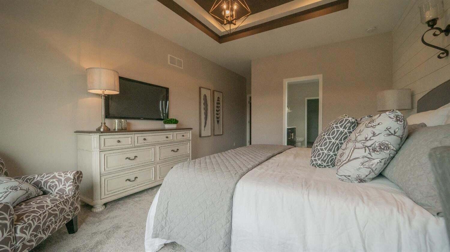 3098 Fawn Lane Portage, IN 46368 - Photo 22 of 22 a bedroom with a bed and a television