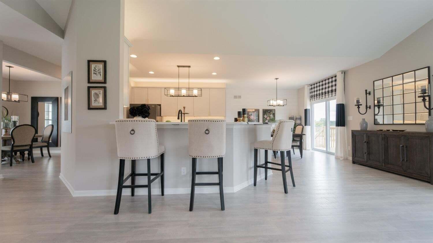3098 Fawn Lane Portage, IN 46368 - Photo 6 of 22 a large kitchen with a table and chairs