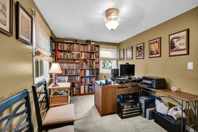 a view of a workspace with furniture