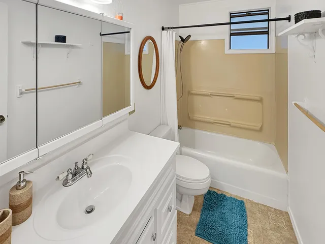 a view of a kitchen area with furniture and a window