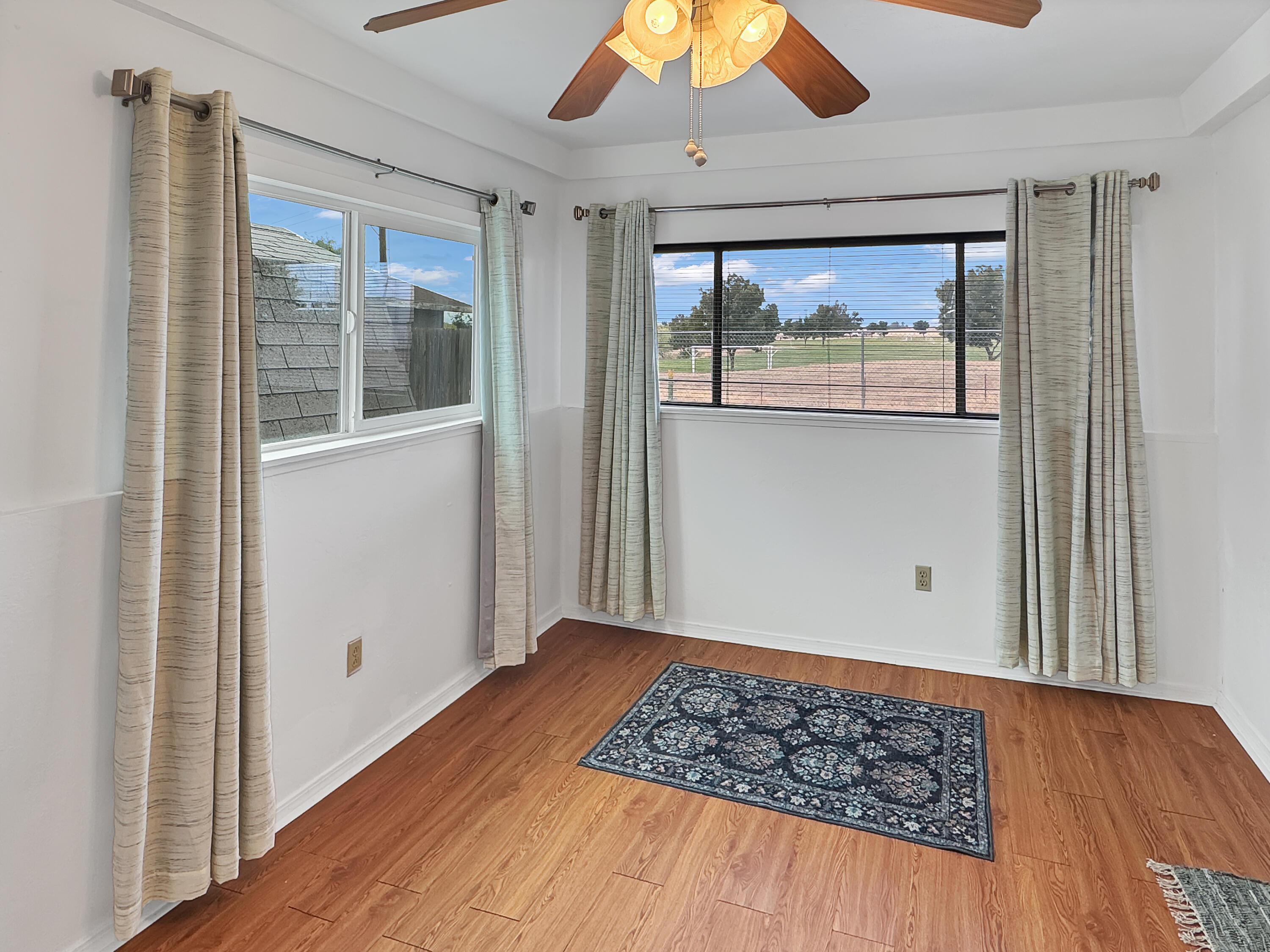 1865 Douglass Street Red Bluff, CA 96080 - Photo 16 of 24 a view of a room with wooden floor and a window