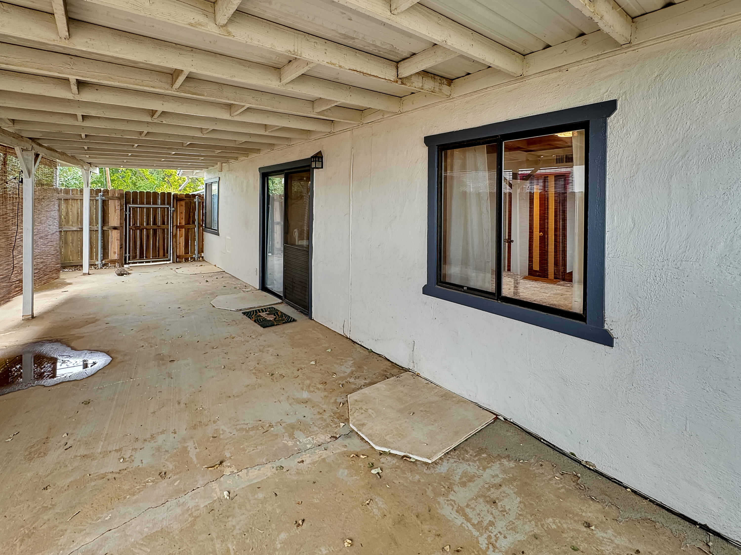 1865 Douglass Street Red Bluff, CA 96080 - Photo 19 of 24 a view of a livingroom with wooden floor and a ceiling fan