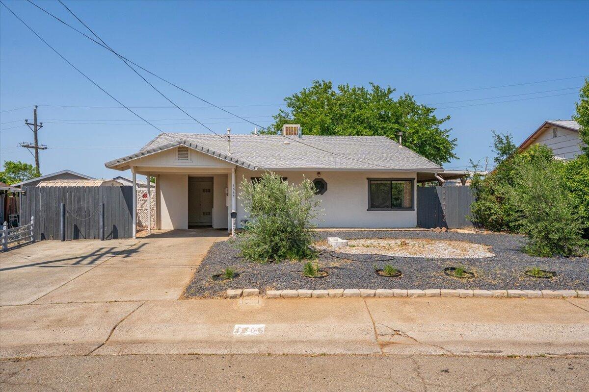 1865 Douglass Street Red Bluff, CA 96080 - Photo 24 of 24 front view of a house with a garden