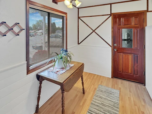 a workspace with furniture and window