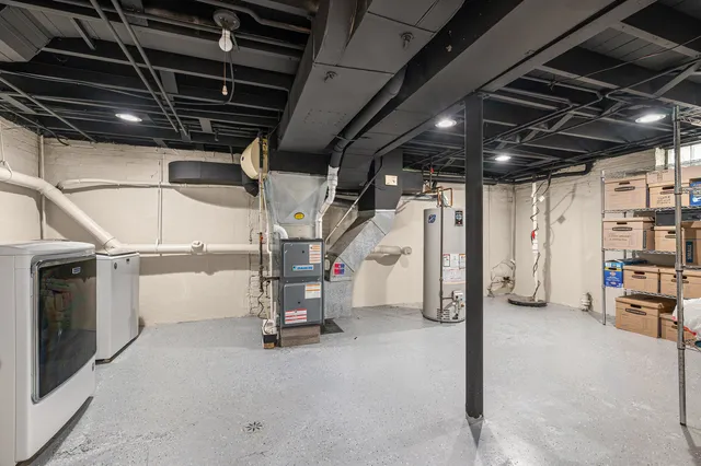 a view of empty room with wooden ceiling