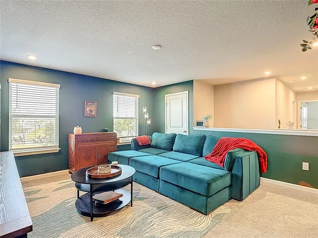 a bathroom with a double vanity sink mirror and shower