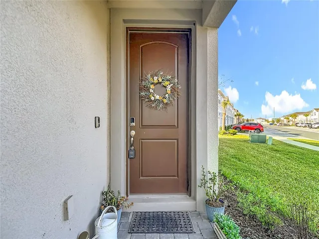 a living room with stainless steel appliances kitchen island granite countertop furniture and a kitchen view