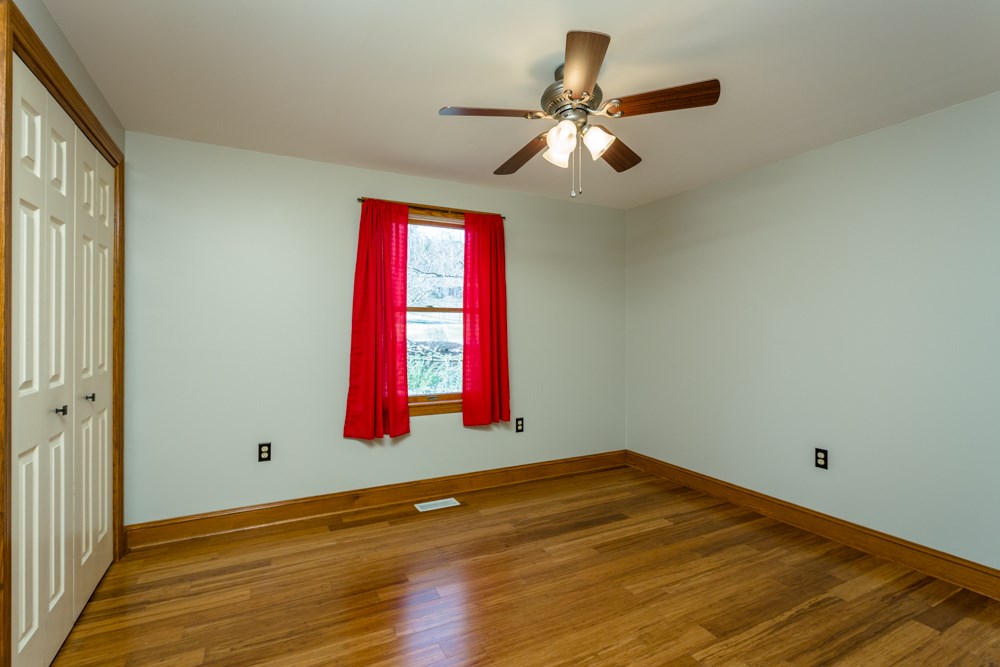 3841 Bull Run Road Penn Laird, VA 22846 - Photo 19 of 49 a view of a room with wooden floor and windows