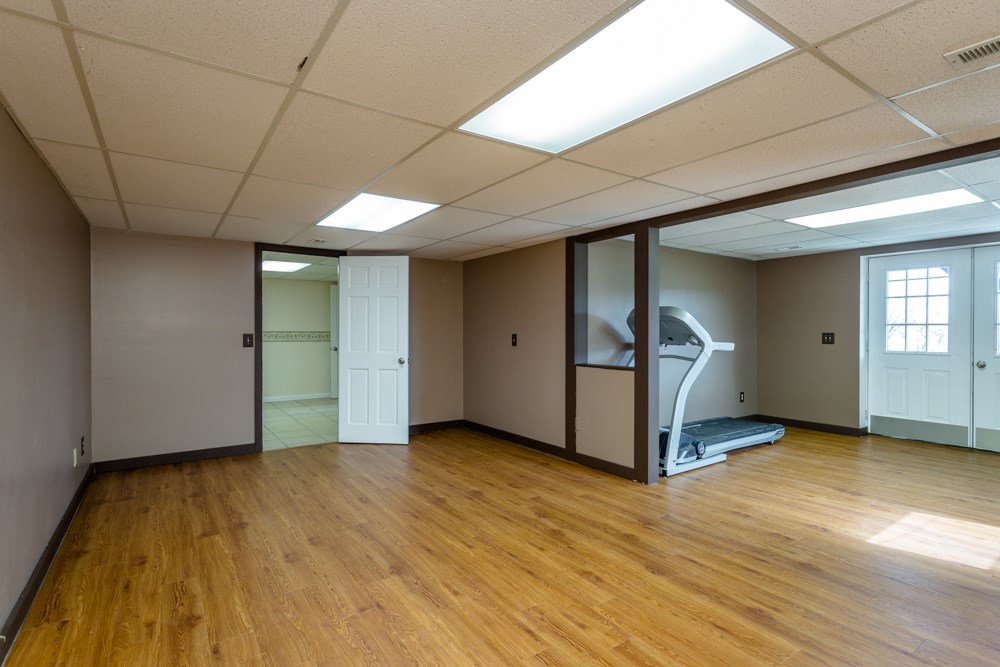 3841 Bull Run Road Penn Laird, VA 22846 - Photo 26 of 49 a view of an empty room with window and wooden floor