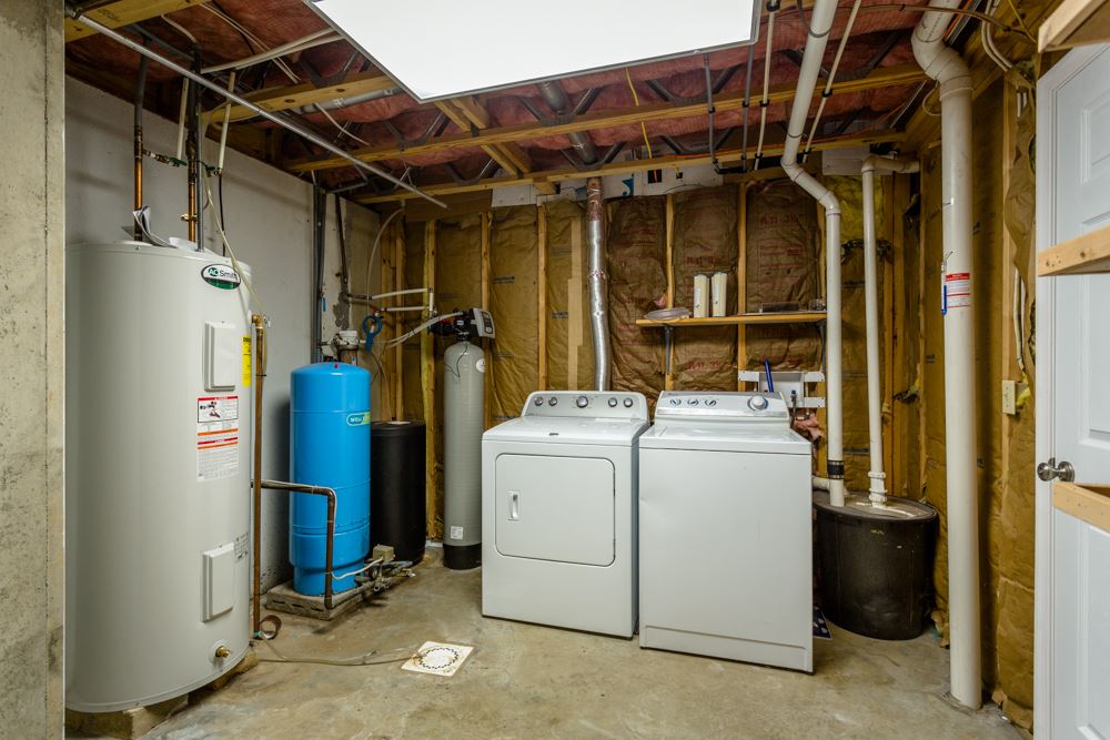 3841 Bull Run Road Penn Laird, VA 22846 - Photo 34 of 49 a view of a storage room with washer and dryer