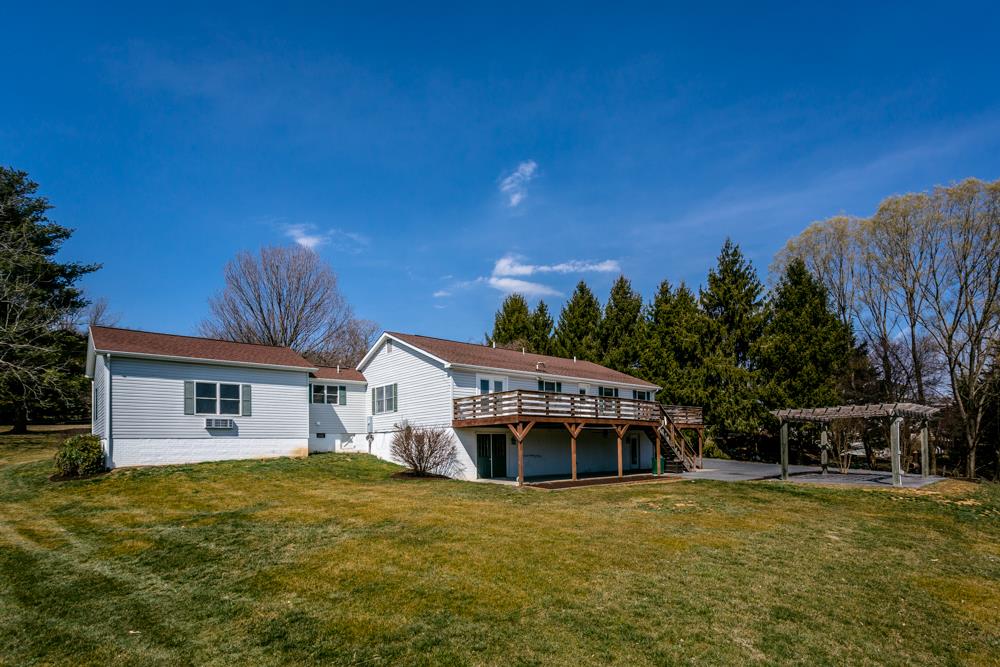 3841 Bull Run Road Penn Laird, VA 22846 - Photo 39 of 49 a house with swimming pool in front of it
