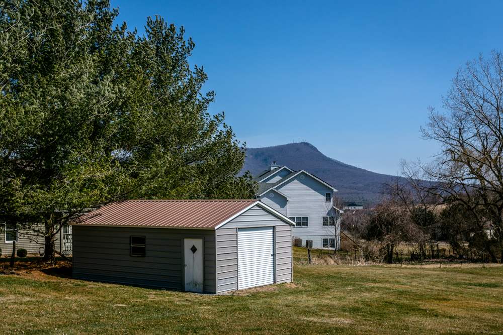 3841 Bull Run Road Penn Laird, VA 22846 - Photo 46 of 49 a front view of a house with a garden