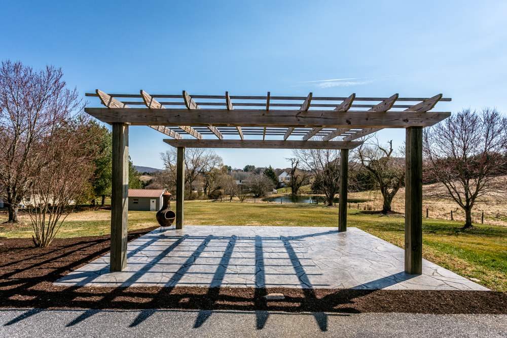 3841 Bull Run Road Penn Laird, VA 22846 - Photo 48 of 49 a view of a swimming pool with a patio and a yard