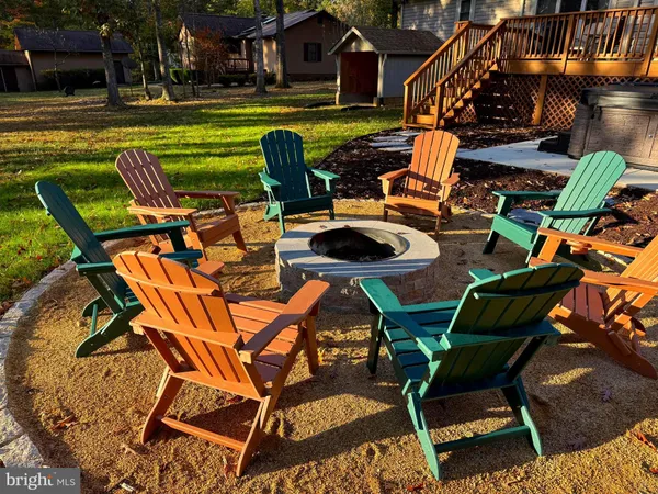 a view of an outdoor sitting area with swimming pool