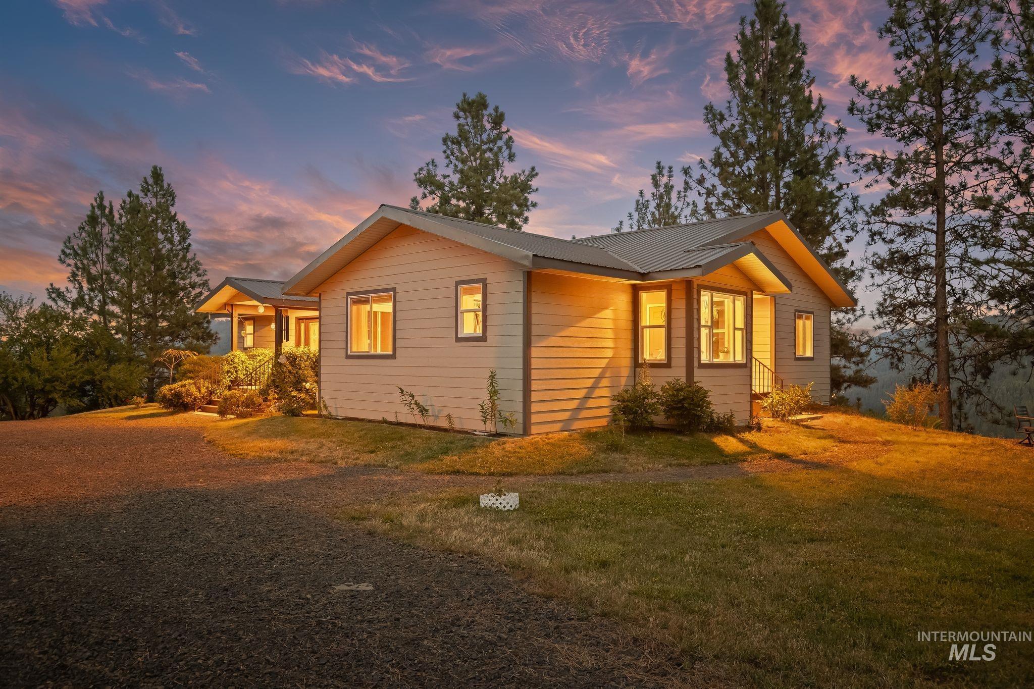 435 River Pointe Lane Lenore, ID 83541 - Photo 44 of 50 Contemporary single-story residence with a metal roof and light-toned siding