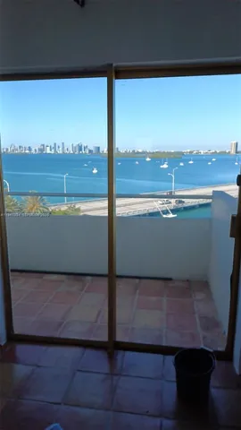a view of a balcony with an ocean view