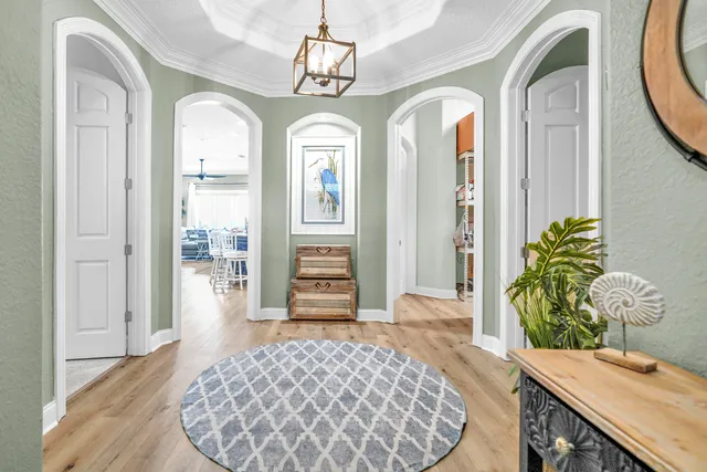 a bedroom with a bed and cabinets