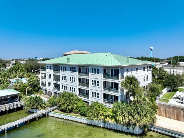 a view of a lake with outdoor seating