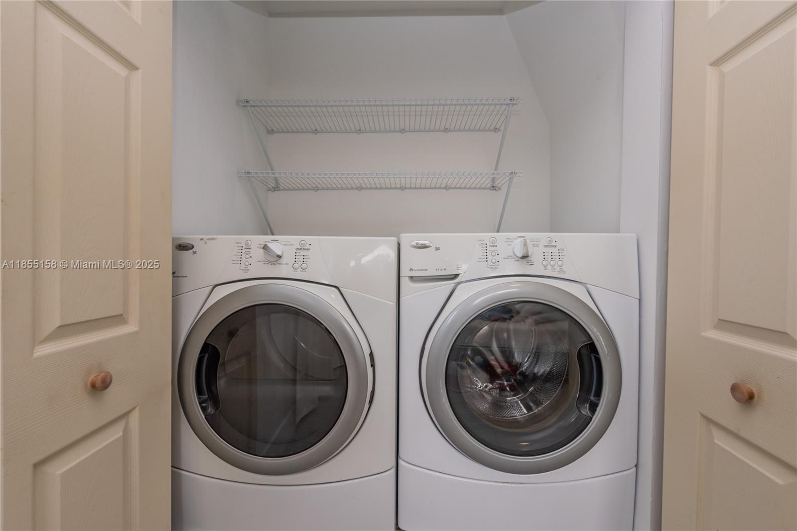 350 Northwest 50th Street Miami, FL 33127 - Photo 16 of 27 a utility room with dryer and washer